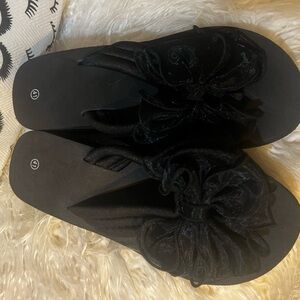 Elegant Black Women's Sandals with Floral Accent